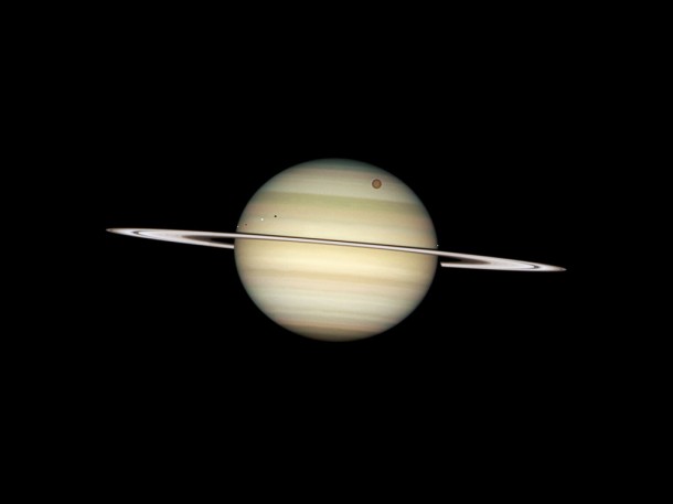 Quadruple Saturn moon transit. Credit: NASA, ESA Quadruple Saturn moon transit. Credit: NASA, ESA