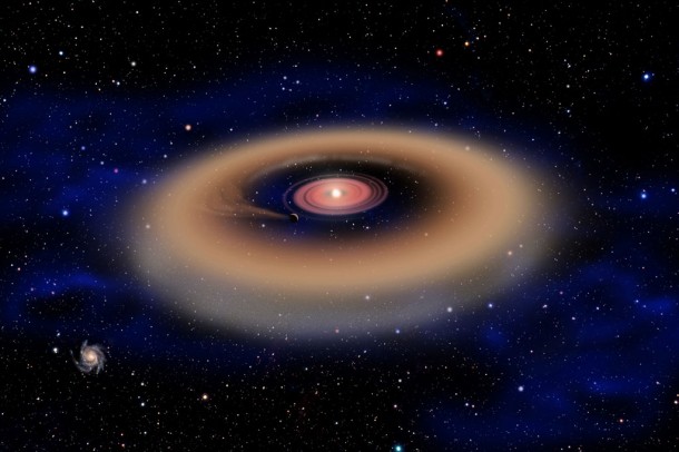 This artist's conception shows a Jupiter-sized planet forming from a disk of dust and gas surrounding a young, massive star. The planet's gravity has cleared a gap in the disk. Of more than 500 stars examined in the W5 star-forming region, 15 show evidence of central clearing that may be due to forming planets. Credit: David A. Aguilar, CfA This artist's conception shows a Jupiter-sized planet forming from a disk of dust and gas surrounding a young, massive star. The planet's gravity has cleared a gap in the disk. Of more than 500 stars examined in the W5 star-forming region, 15 show evidence of central clearing that may be due to forming planets. Credit: David A. Aguilar, CfA