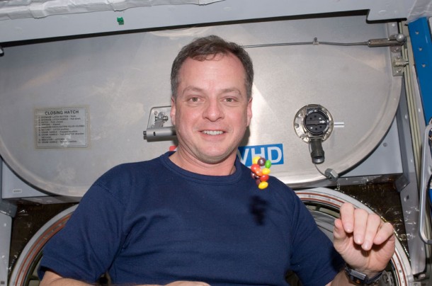 NASA astronaut T.J. Creamer, Expedition 22 flight engineer, is pictured near candy floating freely in the Harmony node of the International Space Station. Credit: NASA NASA astronaut T.J. Creamer, Expedition 22 flight engineer, is pictured near candy floating freely in the Harmony node of the International Space Station. Credit: NASA