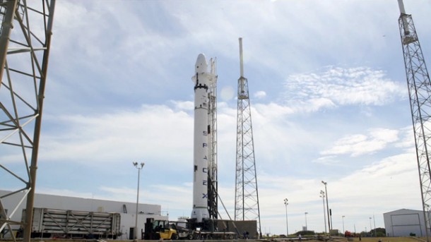 The full flight-ready Falcon 9 with Dragon qualification spacecraft stands on the launch pad at SLC-40, Cape Canaveral, Florida. Credit: SpaceX. The full flight-ready Falcon 9 with Dragon qualification spacecraft stands on the launch pad at SLC-40, Cape Canaveral, Florida. Credit: SpaceX.