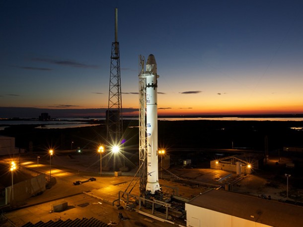 The full flight-ready Falcon 9 with Dragon qualification spacecraft stands on the launch pad at SLC-40, Cape Canaveral, Florida. Credit: Chris Thompson/SpaceX. The full flight-ready Falcon 9 with Dragon qualification spacecraft stands on the launch pad at SLC-40, Cape Canaveral, Florida. Credit: Chris Thompson/SpaceX.