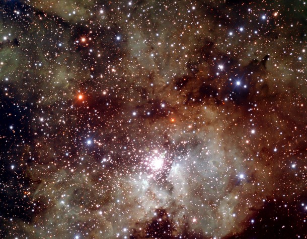 NGC 3603 is a starburst region: a cosmic factory where stars form frantically from the nebula’s extended clouds of gas and dust. Located 22 000 light-years away from the Sun, it is the closest region of this kind known in our galaxy, providing astronomers with a local test bed for studying the intense star formation processes, very common in other galaxies, but hard to observe in detail because of their large distance. Credit: ESO NGC 3603 is a starburst region: a cosmic factory where stars form frantically from the nebula’s extended clouds of gas and dust. Located 22 000 light-years away from the Sun, it is the closest region of this kind known in our galaxy, providing astronomers with a local test bed for studying the intense star formation processes, very common in other galaxies, but hard to observe in detail because of their large distance. Credit: ESO