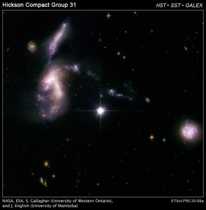 Hickson Compact Group 31: Interacting Galaxies Aglow with Millions of Young Stars 