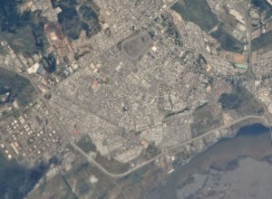 Earthquake damage in Concepcion, Chile is featured in this image photographed by an Expedition 22 crew member on the International Space Station. A dark smoke plume is visible at lower left near an oil refinery in Hualpen. Credit: NASA Earthquake damage in Concepcion, Chile is featured in this image photographed by an Expedition 22 crew member on the International Space Station. A dark smoke plume is visible at lower left near an oil refinery in Hualpen. Credit: NASA