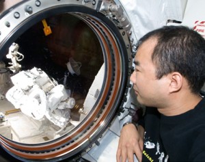 Expedition 23 Flight Engineer Soichi Noguchi looks through a window in the Kibo laboratory of the International Space Station. Credit: NASA Expedition 23 Flight Engineer Soichi Noguchi looks through a window in the Kibo laboratory of the International Space Station. Credit: NASA