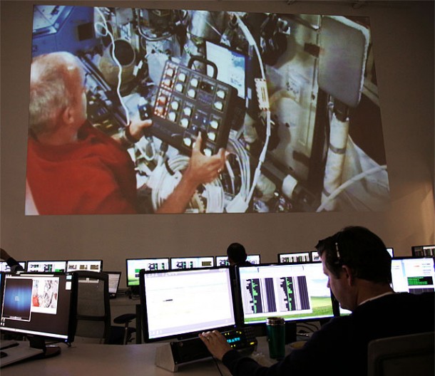 Astronaut Jeff Williams, Expedition 22 Commander (top) aboard the International Space Station, and engineers at SpaceX Mission Control in Hawthorne, California, perform activation and testing of SpaceX's new communications system for operations with upcoming Dragon spacecraft resupply missions to the ISS. Credit: Roger Gilbertson / SpaceX Astronaut Jeff Williams, Expedition 22 Commander (top) aboard the International Space Station, and engineers at SpaceX Mission Control in Hawthorne, California, perform activation and testing of SpaceX's new communications system for operations with upcoming Dragon spacecraft resupply missions to the ISS. Credit: Roger Gilbertson / SpaceX