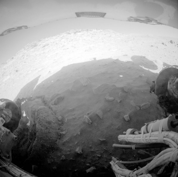 Spirit's view of its own predicament. The rover is now parked for the winter with its solar panels tilted 9 degrees away from the sun. Credit: NASA/JPL-Caltech Spirit's view of its own predicament. The rover is now parked for the winter with its solar panels tilted 9 degrees away from the sun. Credit: NASA/JPL-Caltech
