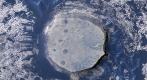 This view of an inverted crater in the Arabia Terra region of Mars is among the images taken by NASA's Mars Reconnaissance Orbiter in early 2010 as the spacecraft approached the 100-terabit milestone in total data returned. Image Credit: NASA/JPL-Caltech/University of Arizona This view of an inverted crater in the Arabia Terra region of Mars is among the images taken by NASA's Mars Reconnaissance Orbiter in early 2010 as the spacecraft approached the 100-terabit milestone in total data returned. Image Credit: NASA/JPL-Caltech/University of Arizona