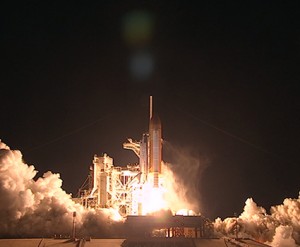 Space shuttle Discovery lifts off. Image credit: NASA TV   
