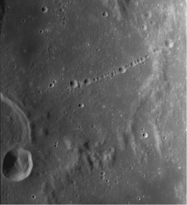 The 50-km-long Catena Davy at 10.9°S, 353.5°E in LROC WAC frame M119896473ME; north is up. Credit: NASA/GSFC/Arizona State University The 50-km-long Catena Davy at 10.9°S, 353.5°E in LROC WAC frame M119896473ME; north is up. Credit: NASA/GSFC/Arizona State University