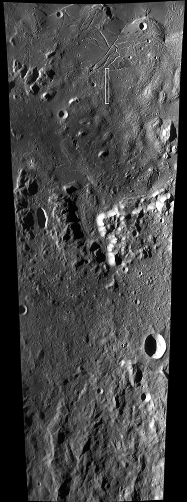 The small white rectangle near the top of this image illustrates the location of the NAC image with the small crater chain and the scale of the Orientale multi-ring basin. The Inner Rook Montes run across the middle of the frame and the Outer Rook Montes lie to the bottom. These mountains are parts of two rings that surround Mare Orientale. LROC WAC image M102788066ME; north is up. Credit: NASA/GSFC/Arizona State University The small white rectangle near the top of this image illustrates the location of the NAC image with the small crater chain and the scale of the Orientale multi-ring basin. The Inner Rook Montes run across the middle of the frame and the Outer Rook Montes lie to the bottom. These mountains are parts of two rings that surround Mare Orientale. LROC WAC image M102788066ME; north is up. Credit: NASA/GSFC/Arizona State University