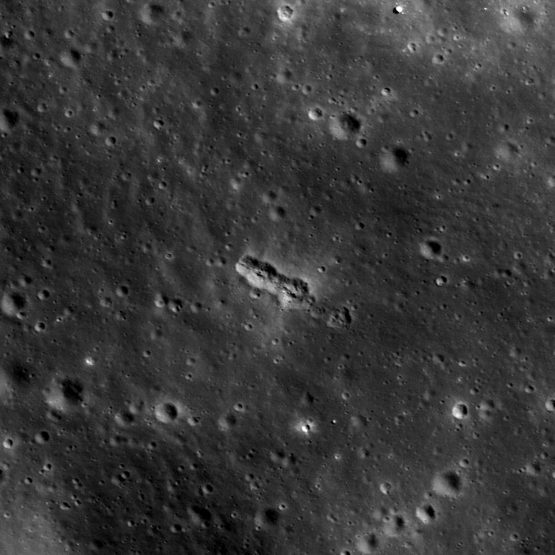 A small secondary crater chain near the southwestern margin of Mare Orientale, within the Inner Rook Mountains. The ~125-meter-long chain lies within one of the Constellation Program regions of interest in the Orientale multi-ring basin. Image is about 530 meters across, and was taken Nov. 7, 2009 at an altitude of 53.5 km. One pixel is approximately .55 meters. Credit: NASA/GSFC/Arizona State University. A small secondary crater chain near the southwestern margin of Mare Orientale, within the Inner Rook Mountains. The ~125-meter-long chain lies within one of the Constellation Program regions of interest in the Orientale multi-ring basin. Image is about 530 meters across, and was taken Nov. 7, 2009 at an altitude of 53.5 km. One pixel is approximately .55 meters. Credit: NASA/GSFC/Arizona State University.