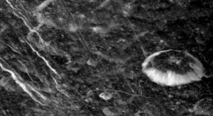 This image was taken on April 7, 2010 by NASA's Cassini spacecraft. The camera was pointing at Saturn. But, by appropriate orientation of the spacecraft, the cameras were able to capture Dione in the sights. Image Credit: NASA/JPL/Space Science Institute This image was taken on April 7, 2010 by NASA's Cassini spacecraft. The camera was pointing at Saturn. But, by appropriate orientation of the spacecraft, the cameras were able to capture Dione in the sights. Image Credit: NASA/JPL/Space Science Institute