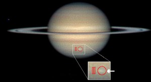 Amateur astronomer Christopher Go took this image of the storm on March 13, 2010. The arrow indicates the location of the storm and the red outlines show where Cassini's composite infrared spectrometer gathered data. Image credit: C.Go and NASA/JPL-Caltech/GSFC Amateur astronomer Christopher Go took this image of the storm on March 13, 2010. The arrow indicates the location of the storm and the red outlines show where Cassini's composite infrared spectrometer gathered data. Image credit: C.Go and NASA/JPL-Caltech/GSFC