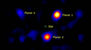 This image shows the light from three planets orbiting a star 120 light-years away. The planets' star, called HR8799, is located at the spot marked with an 'X.' Image credit: NASA/JPL-Caltech/Palomar Observatory This image shows the light from three planets orbiting a star 120 light-years away. The planets' star, called HR8799, is located at the spot marked with an 'X.' Image credit: NASA/JPL-Caltech/Palomar Observatory