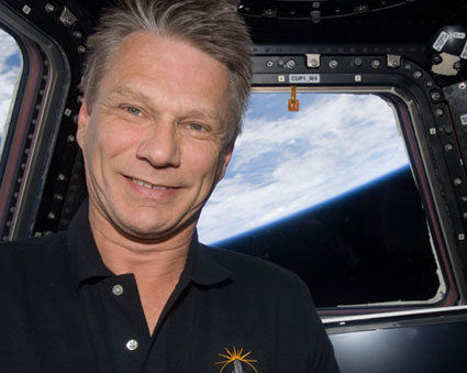 Mission Specialist Piers Sellers poses for a photo inside the cupola of the International Space Station. Credit: NASA Mission Specialist Piers Sellers poses for a photo inside the cupola of the International Space Station. Credit: NASA