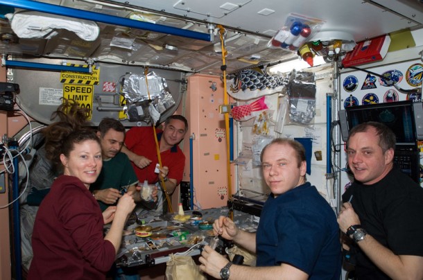 Expedition 23 crew members share a meal in the Unity node of the International Space Station. Credit: NASA Expedition 23 crew members share a meal in the Unity node of the International Space Station. Credit: NASA