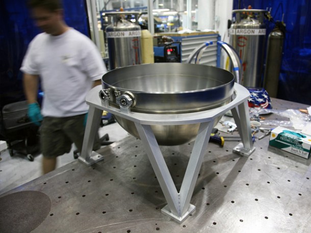 Technicians prepare a titanium hemisphere for installation of the interior components and welding of a second half to make a complete propellant tank. Credit: SpaceX. Technicians prepare a titanium hemisphere for installation of the interior components and welding of a second half to make a complete propellant tank. Credit: SpaceX.