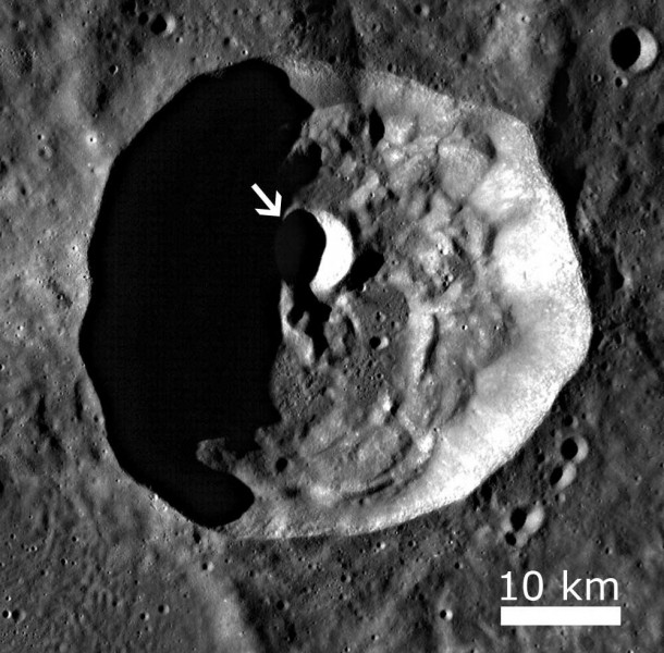 LROC WAC monochrome context image of complex crater Henry Frères (~42 km diameter), with a smaller, ~7 km diameter crater superposed (arrow). The floor of this smaller crater is highlighted in today's Featured Image (top). Image M117880746ME, scene is 55 km across. Credit: NASA/GSFC/Arizona State University LROC WAC monochrome context image of complex crater Henry Frères (~42 km diameter), with a smaller, ~7 km diameter crater superposed (arrow). The floor of this smaller crater is highlighted in today's Featured Image (top). Image M117880746ME, scene is 55 km across. Credit: NASA/GSFC/Arizona State University