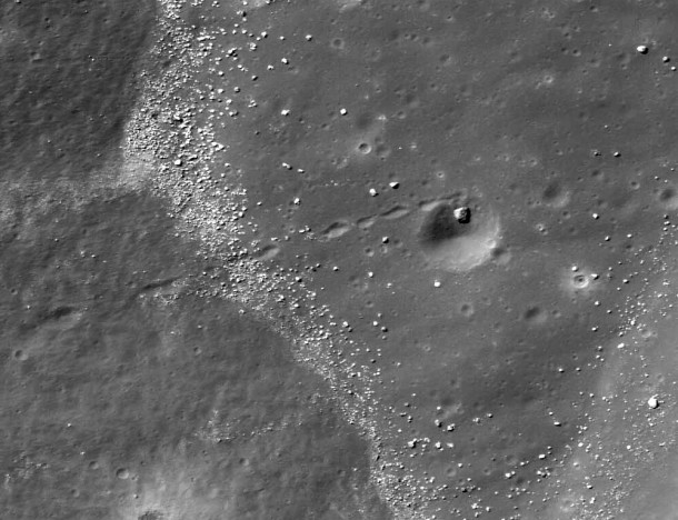 A house-sized boulder (10 m diameter) rolled down-hill, scoring a hole in one (~60 m diameter crater)! Portion of LROC NAC M122597190L, image width is 500 m across. Credit: NASA/GSFC/Arizona State University A house-sized boulder (10 m diameter) rolled down-hill, scoring a hole in one (~60 m diameter crater)! Portion of LROC NAC M122597190L, image width is 500 m across. Credit: NASA/GSFC/Arizona State University