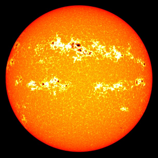 Although sunspots cause a decrease in irradiance they're accompanied by bright white blotches called faculae that cause an overall increase in solar irradiance. Credit: NASA/Goddard/SORCE Although sunspots cause a decrease in irradiance they're accompanied by bright white blotches called faculae that cause an overall increase in solar irradiance. Credit: NASA/Goddard/SORCE