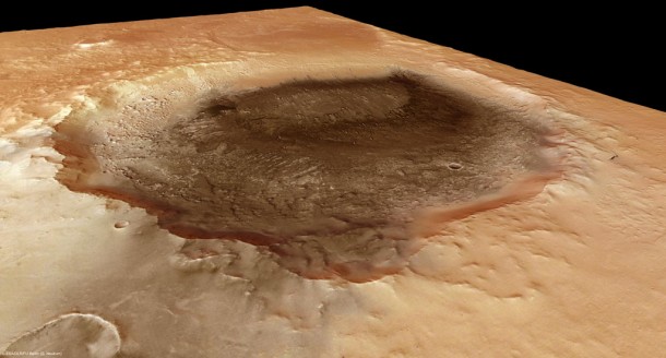 Meridiani Planum at the northern edge of the southern highlands of Mars. In the centre of the image is an impact crater almost 50 km across, covered in dark material that resembles volcanic ash. Credits: ESA/DLR/FU Berlin (G. Neukum) Meridiani Planum at the northern edge of the southern highlands of Mars. In the centre of the image is an impact crater almost 50 km across, covered in dark material that resembles volcanic ash. Credits: ESA/DLR/FU Berlin (G. Neukum)