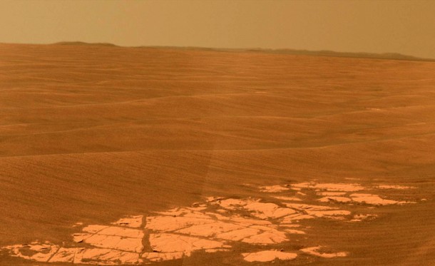 This image shows an outcrop of rocks at the foot of the rover and beyond these rocks rippled dunes, which are about 20 centimeters (8 inches) tall. Credit: NASA/JPL-Caltech/Cornell University This image shows an outcrop of rocks at the foot of the rover and beyond these rocks rippled dunes, which are about 20 centimeters (8 inches) tall. Credit: NASA/JPL-Caltech/Cornell University
