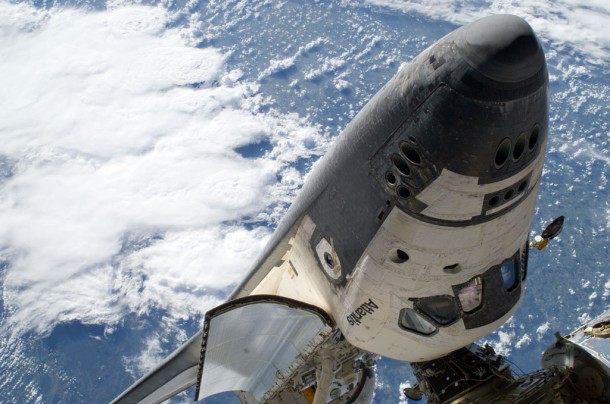 Space shuttle Atlantis, docked to the International Space Station, is featured in this image photographed by an STS-132 spacewalker during the mission's first spacewalk. Space shuttle Atlantis, docked to the International Space Station, is featured in this image photographed by an STS-132 spacewalker during the mission's first spacewalk.