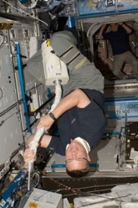 Expedition 24 Flight Engineer Doug Wheelock uses a vacuum cleaner during housekeeping operations in the Destiny laboratory of the International Space Station. Image Credit: NASA. Expedition 24 Flight Engineer Doug Wheelock uses a vacuum cleaner during housekeeping operations in the Destiny laboratory of the International Space Station. Image Credit: NASA.