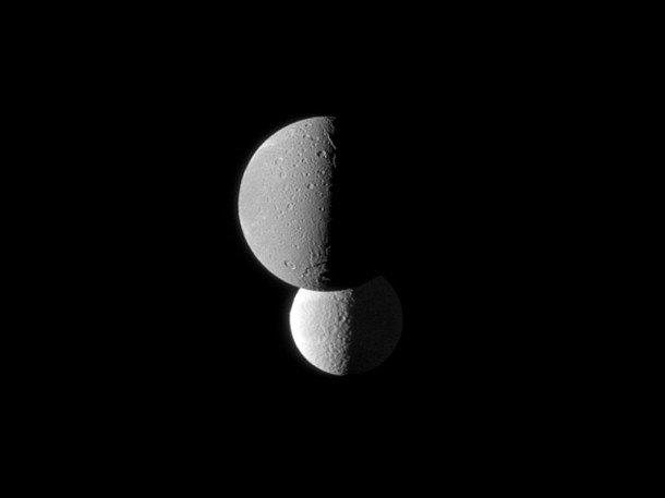 Saturn's moon Dione, in the foreground of this Cassini spacecraft image, appears darker than the moon Tethys. Credit: NASA/JPL/Space Science Institute Saturn's moon Dione, in the foreground of this Cassini spacecraft image, appears darker than the moon Tethys. Credit: NASA/JPL/Space Science Institute