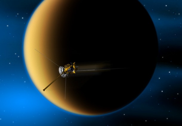 Artist's concept of Cassini's flyby of Saturn's moon Titan. The spacecraft flies to within 880 kilometers (547 miles) of Titan's surface during its 71st flyby of Titan, known as "T70," the lowest in the entire mission. Image credit: NASA/JPL-Caltech Artist's concept of Cassini's flyby of Saturn's moon Titan. The spacecraft flies to within 880 kilometers (547 miles) of Titan's surface during its 71st flyby of Titan, known as "T70," the lowest in the entire mission. Image credit: NASA/JPL-Caltech