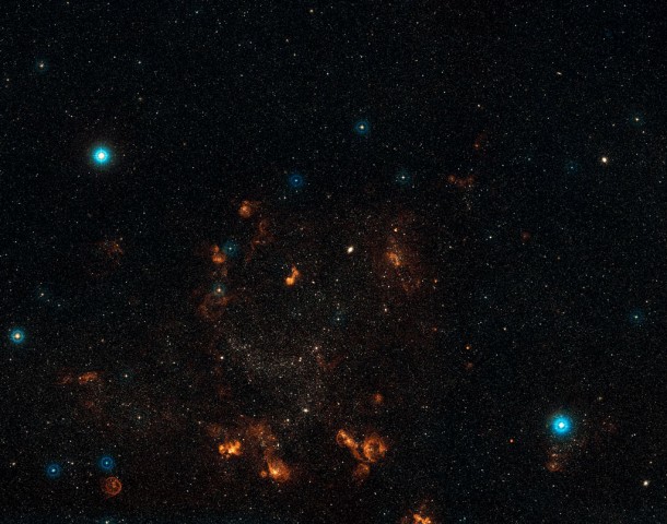 This wide-field view shows a section of the Large Magellanic Cloud, centred on the unusual globular cluster NGC 1978. The image was created from photographs in red and blue light taken from the Digitized Sky Survey 2. The field of view is 2.9 degrees across. Credit: ESO, Digitized Sky Survey 2. Acknowledgement: Davide De Martin This wide-field view shows a section of the Large Magellanic Cloud, centred on the unusual globular cluster NGC 1978. The image was created from photographs in red and blue light taken from the Digitized Sky Survey 2. The field of view is 2.9 degrees across. Credit: ESO, Digitized Sky Survey 2. Acknowledgement: Davide De Martin