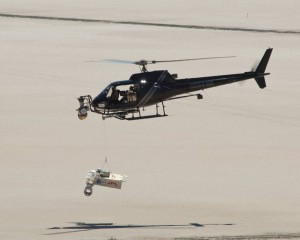 This test of the radar system to be used during the August 2012 descent and landing of the NASA Mars rover Curiosity mounted an engineering test model of the radar system onto the nose of a helicopter. Image Credit: NASA This test of the radar system to be used during the August 2012 descent and landing of the NASA Mars rover Curiosity mounted an engineering test model of the radar system onto the nose of a helicopter. Image Credit: NASA