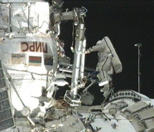 A Russian spacewalker works outside the Pirs docking compartment after beginning the first Expedition 24 spacewalk. Credit: NASA TV A Russian spacewalker works outside the Pirs docking compartment after beginning the first Expedition 24 spacewalk. Credit: NASA TV