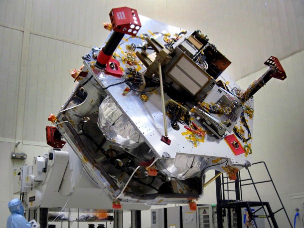 Once the radiation vault was installed on top of the propulsion module, NASA's Juno spacecraft was lifted onto a large rotation fixture to continue with its assembly process. Image Credit: NASA/JPL-Caltech/LMSS Once the radiation vault was installed on top of the propulsion module, NASA's Juno spacecraft was lifted onto a large rotation fixture to continue with its assembly process. Image Credit: NASA/JPL-Caltech/LMSS