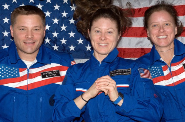 Expedition 24 Flight Engineers Doug Wheelock, Tracy Caldwell Dyson (center) and Shannon Walker pose for a photo with an American flag while aboard the International Space Station. Credit: NASA Expedition 24 Flight Engineers Doug Wheelock, Tracy Caldwell Dyson (center) and Shannon Walker pose for a photo with an American flag while aboard the International Space Station. Credit: NASA