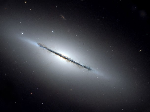 This is a unique Hubble Space Telescope view of the disk galaxy NGC 5866. Credit: NASA, ESA, and The Hubble Heritage Team STScI/AURA) This is a unique Hubble Space Telescope view of the disk galaxy NGC 5866. Credit: NASA, ESA, and The Hubble Heritage Team STScI/AURA)