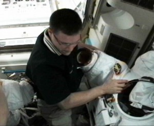 In the International Space Station’s Quest airlock, Expedition 24 Flight Engineer Doug Wheelock works on a spacesuit in preparation for the second spacewalk to remove a failed ammonia pump module on the station's S1 Truss. Credit: NASA TV In the International Space Station’s Quest airlock, Expedition 24 Flight Engineer Doug Wheelock works on a spacesuit in preparation for the second spacewalk to remove a failed ammonia pump module on the station's S1 Truss. Credit: NASA TV