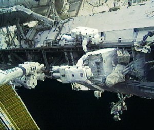 Flight Engineer Doug Wheelock is attached to Canadarm2 as he removes the failed 780-pound ammonia pump module. Tracy Caldwell Dyson assists him from the S1 Truss during Wednesday’s spacewalk. Credit: NASA TV Flight Engineer Doug Wheelock is attached to Canadarm2 as he removes the failed 780-pound ammonia pump module. Tracy Caldwell Dyson assists him from the S1 Truss during Wednesday’s spacewalk. Credit: NASA TV