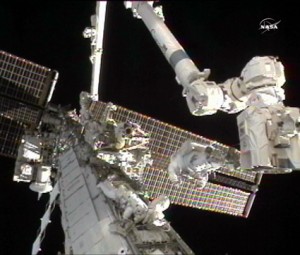 Expedition 24 Flight Engineers Doug Wheelock (right) and Tracy Caldwell Dyson work to replace a failed ammonia pump module outside of the International Space Station. Credit: NASA TV Expedition 24 Flight Engineers Doug Wheelock (right) and Tracy Caldwell Dyson work to replace a failed ammonia pump module outside of the International Space Station. Credit: NASA TV