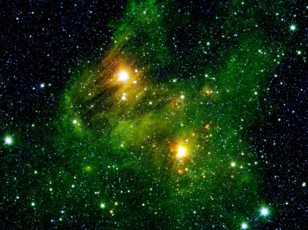 Two extremely bright stars illuminate a greenish mist in this image from the new "GLIMPSE360" survey from NASA's Spitzer Space Telescope. Credit: NASA/JPL-Caltech/2MASS/SSI/University of Wisconsin Two extremely bright stars illuminate a greenish mist in this image from the new "GLIMPSE360" survey from NASA's Spitzer Space Telescope. Credit: NASA/JPL-Caltech/2MASS/SSI/University of Wisconsin