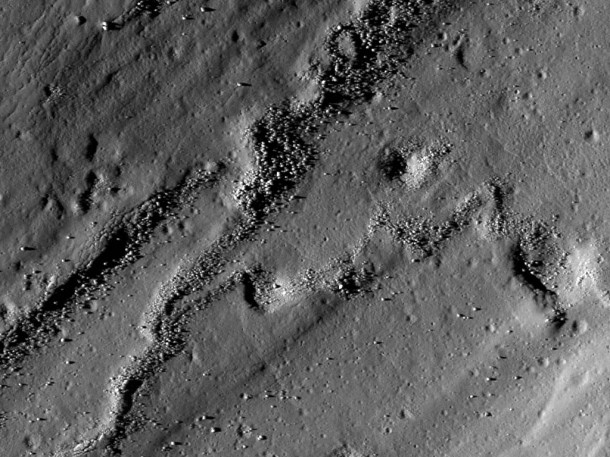 A flood of impact melt swept away from the rim of Necho crater. NAC image M119041553; scene width is 540 m. Credit: NASA/GSFC/Arizona State University A flood of impact melt swept away from the rim of Necho crater. NAC image M119041553; scene width is 540 m. Credit: NASA/GSFC/Arizona State University
