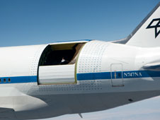 The high-tech German-built infrared telescope and its associated lower flexible telescope cavity door are rotated upward to their maximum 58-degree vertical position in this close-up photo taken during the last flight in the SOFIA observatory's flight envelope-expansion test series. (NASA photo / Carla Thomas) The high-tech German-built infrared telescope and its associated lower flexible telescope cavity door are rotated upward to their maximum 58-degree vertical position in this close-up photo taken during the last flight in the SOFIA observatory's flight envelope-expansion test series. (NASA photo / Carla Thomas)