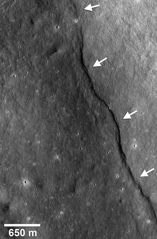 Over recent geologic time, as the lunar interior cooled and contracted the entire moon shrank by about 100 m. As a result its brittle crust ruptured and thrust faults (compression) formed distinctive landforms known as lobate scarps. In a particularly dramatic example, a thrust fault pushed crustal materials (arrows) up the side of the farside impact crater named Gregory (2.1°N, 128.1°E). By mapping the distribution and determining the size of all lobate scarps, the tectonic and thermal history of the moon can be reconstructed over the past billion years. Credit: NASA/Goddard/Arizona State University/Smithsonian Over recent geologic time, as the lunar interior cooled and contracted the entire moon shrank by about 100 m. As a result its brittle crust ruptured and thrust faults (compression) formed distinctive landforms known as lobate scarps. In a particularly dramatic example, a thrust fault pushed crustal materials (arrows) up the side of the farside impact crater named Gregory (2.1°N, 128.1°E). By mapping the distribution and determining the size of all lobate scarps, the tectonic and thermal history of the moon can be reconstructed over the past billion years. Credit: NASA/Goddard/Arizona State University/Smithsonian