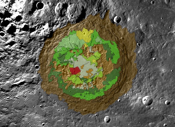 This detailed geologic map of Schrödinger basin, which formed when a huge object struck the moon, reveals a patchwork of lunar material, including the peak ring (inner brown ring), recent volcanic activity (red), cratering (yellow) and plains material (dark green and kelly green). Credit: NASA/Scott Mest This detailed geologic map of Schrödinger basin, which formed when a huge object struck the moon, reveals a patchwork of lunar material, including the peak ring (inner brown ring), recent volcanic activity (red), cratering (yellow) and plains material (dark green and kelly green). Credit: NASA/Scott Mest