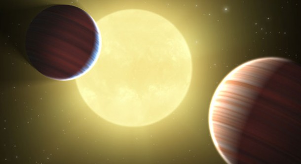 This artist's concept illustrates the two Saturn-sized planets discovered by NASA’s Kepler mission. The star system is oriented edge-on, as seen by Kepler, such that both planets cross in front, or transit, their star, named Kepler-9. This is the first star system found to have multiple transiting planets. Image credit: NASA/Ames/JPL-Caltech This artist's concept illustrates the two Saturn-sized planets discovered by NASA’s Kepler mission. The star system is oriented edge-on, as seen by Kepler, such that both planets cross in front, or transit, their star, named Kepler-9. This is the first star system found to have multiple transiting planets. Image credit: NASA/Ames/JPL-Caltech