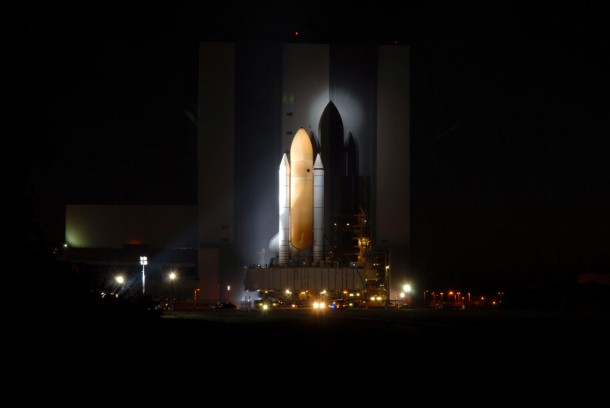 Space shuttle Discovery leaves the cavernous Vehicle Assembly Building. Discovery is targeted for launch Nov. 1 on the STS-133 mission. Credit: NASA Space shuttle Discovery leaves the cavernous Vehicle Assembly Building. Discovery is targeted for launch Nov. 1 on the STS-133 mission. Credit: NASA