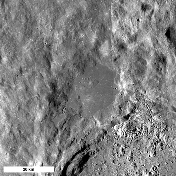 A large (17 km east to west), smooth impact melt "pond" on the northwest rim of King crater (72 km diameter). Credit: NASA/Goddard/ASU A large (17 km east to west), smooth impact melt "pond" on the northwest rim of King crater (72 km diameter). Credit: NASA/Goddard/ASU