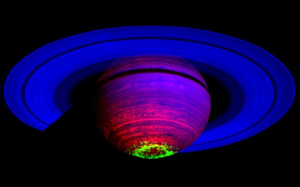 This false-color composite image, constructed from data obtained by NASA's Cassini spacecraft, shows the glow of auroras streaking out about 1,000 kilometers (600 miles) from the cloud tops of Saturn's south polar region. Credit: NASA/JPL/University of Arizona/University of Leicester This false-color composite image, constructed from data obtained by NASA's Cassini spacecraft, shows the glow of auroras streaking out about 1,000 kilometers (600 miles) from the cloud tops of Saturn's south polar region. Credit: NASA/JPL/University of Arizona/University of Leicester