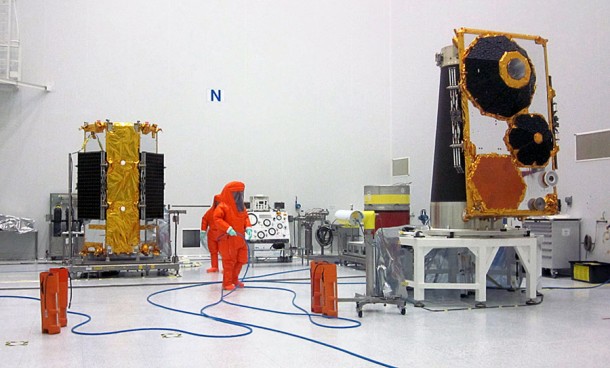 Two Globalstar second-generation satellites are shown during the fueling preparation sequence in Starsem’s Baikonur Cosmodrome facilities. The spacecraft at right is mounted on the dispenser. Credit: Arianespace Two Globalstar second-generation satellites are shown during the fueling preparation sequence in Starsem’s Baikonur Cosmodrome facilities. The spacecraft at right is mounted on the dispenser. Credit: Arianespace
